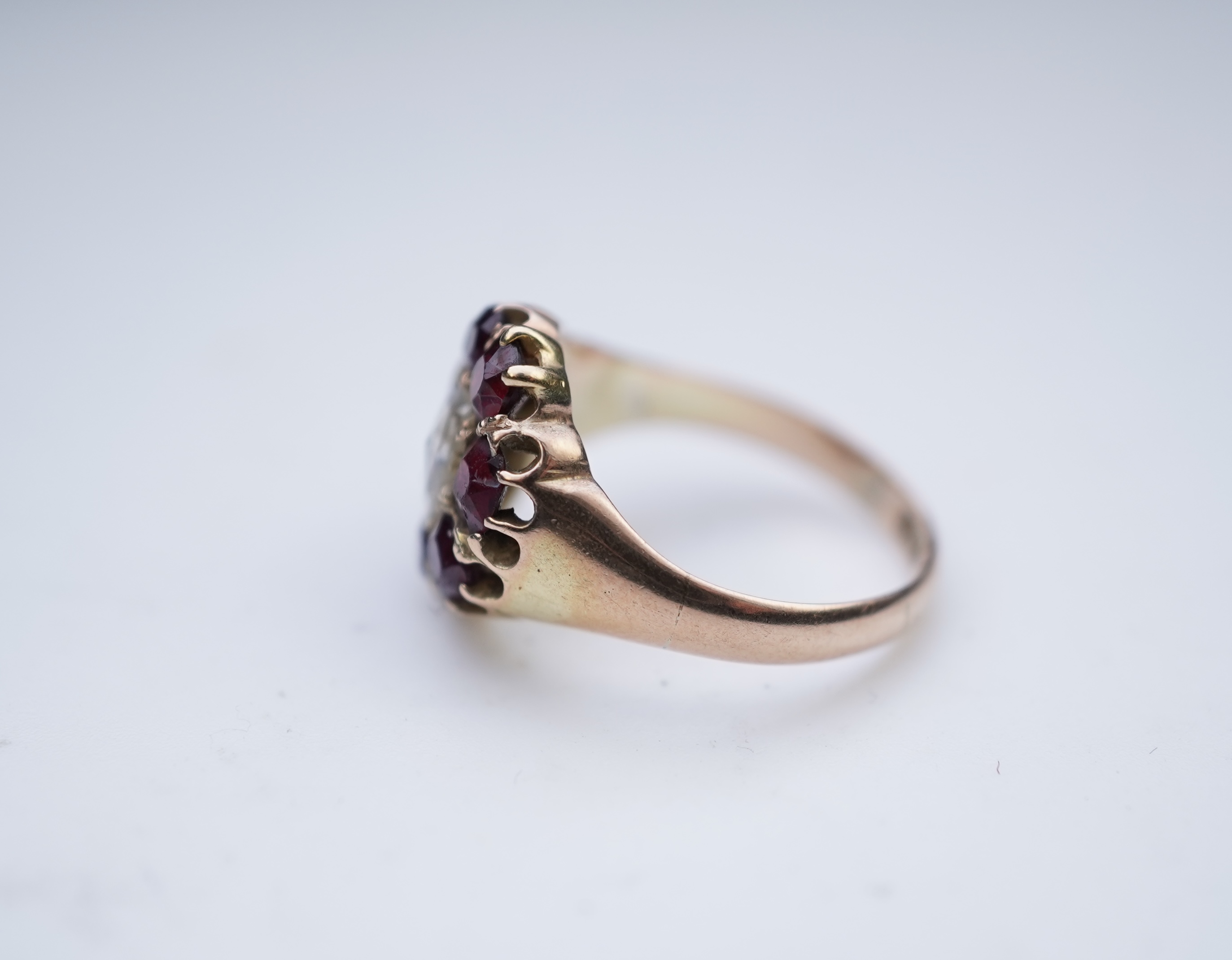 A garnet and diamond ring, late 19th century